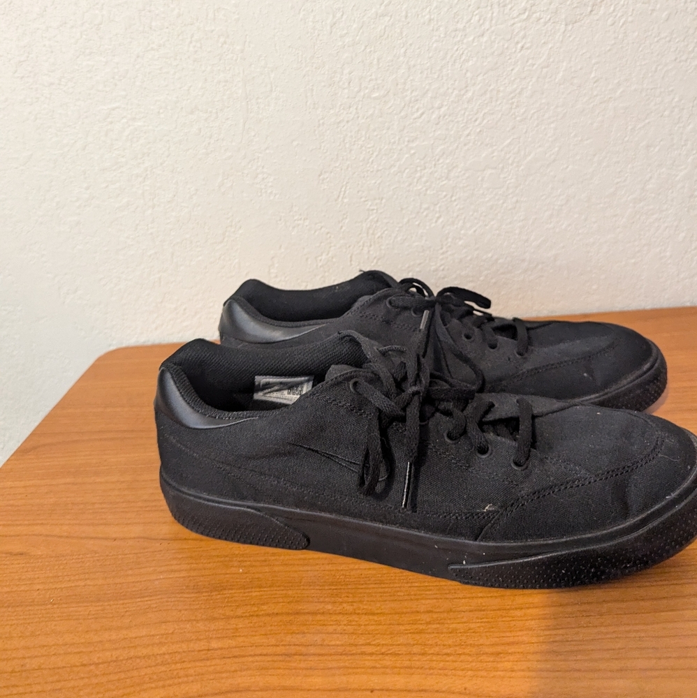 Nike retro GTS triple black low canvas shoes.
